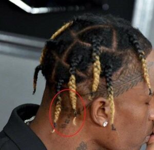 “Cactus Jack” Tattoo behind his Right Ear 